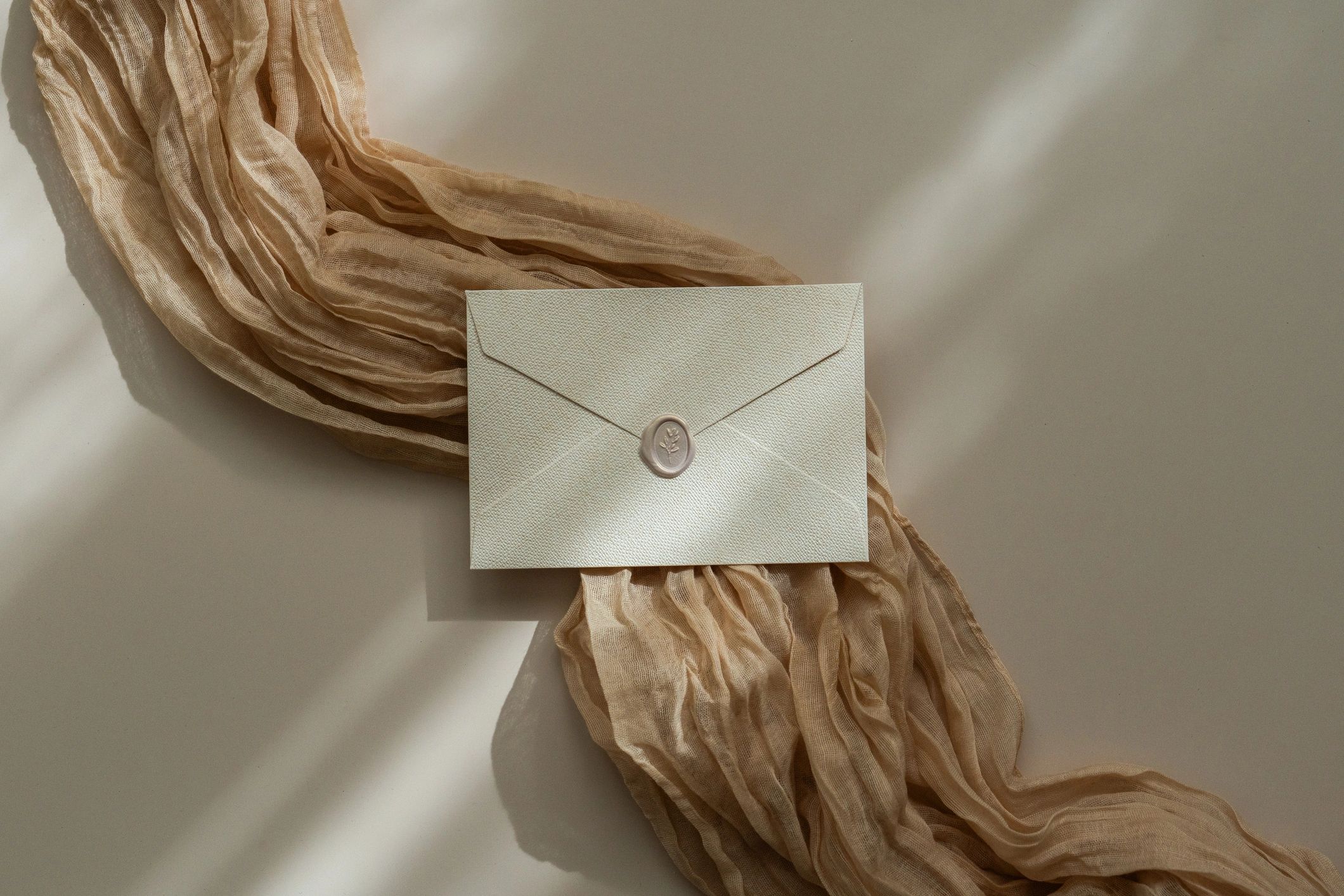 Single ScriptHaven Thought of the Day letter with matching envelope—warm, elegant stationery mockup.