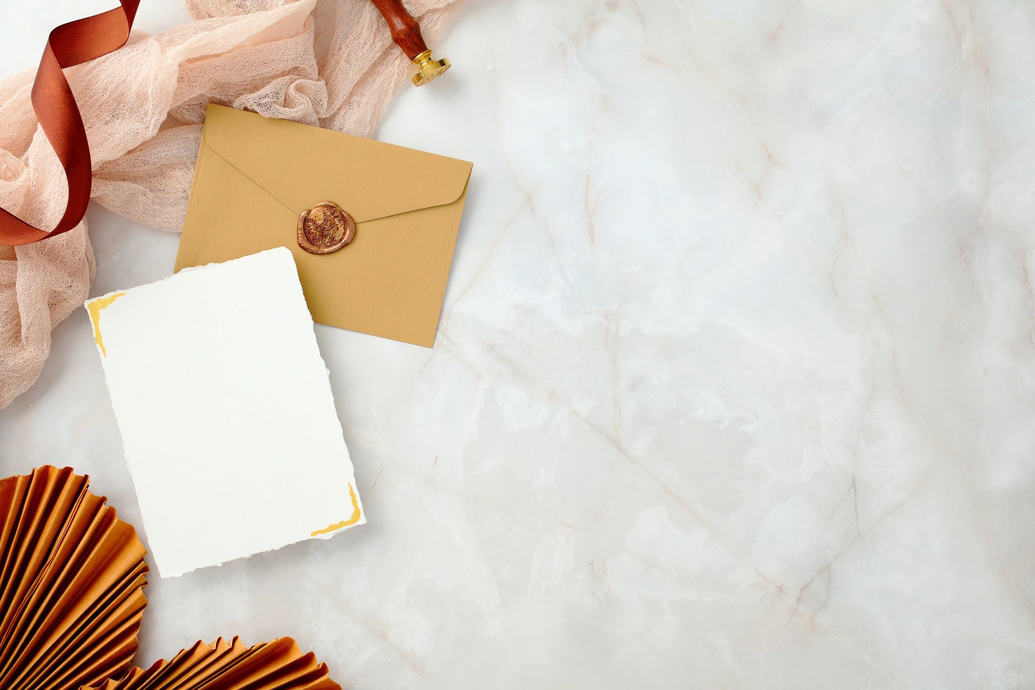Styled flat lay with a sealed envelope and blank card