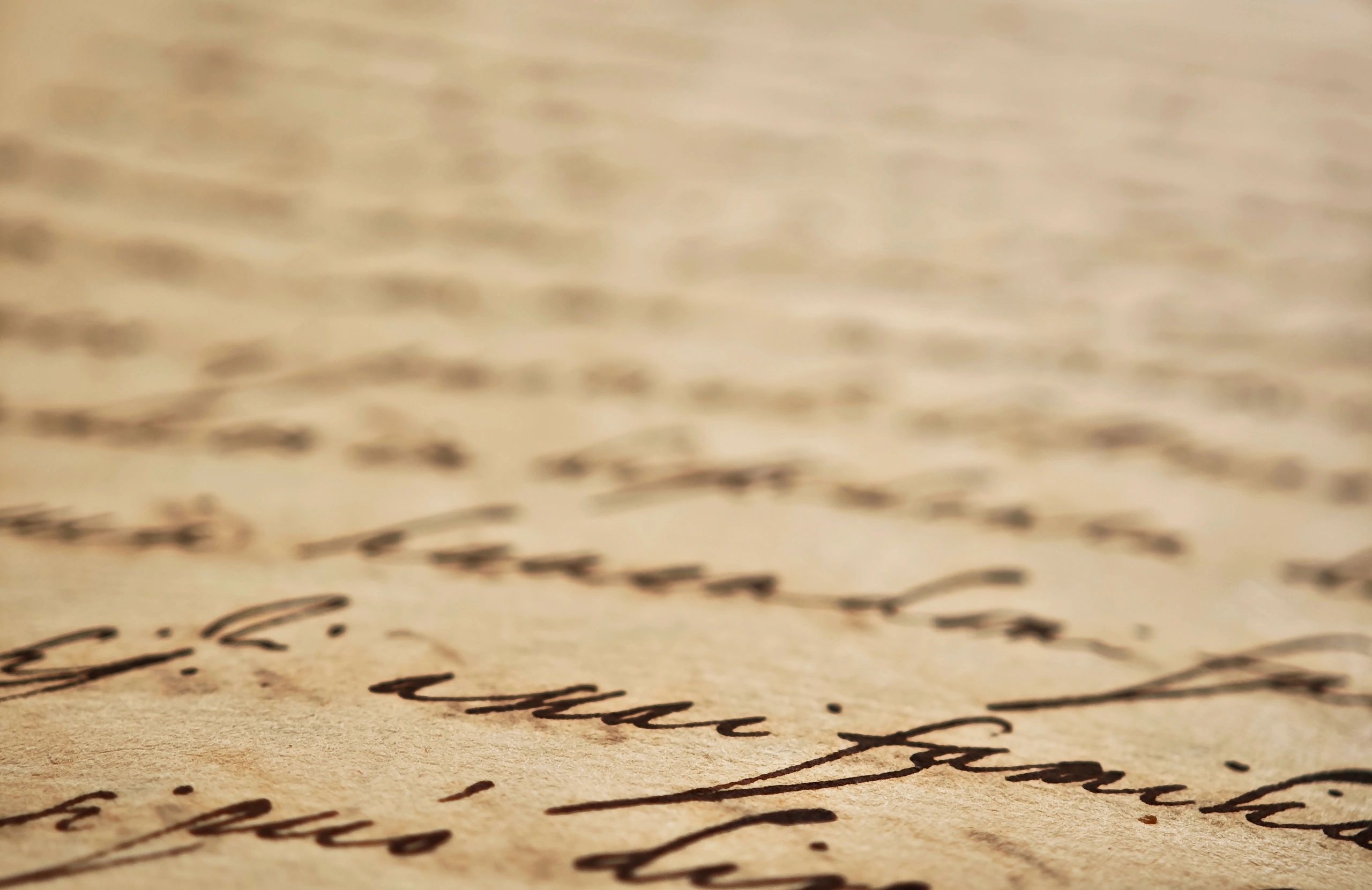 Close-up of handwriting on paper used as a neutral testimonial avatar image.